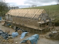 Main building roof goes on